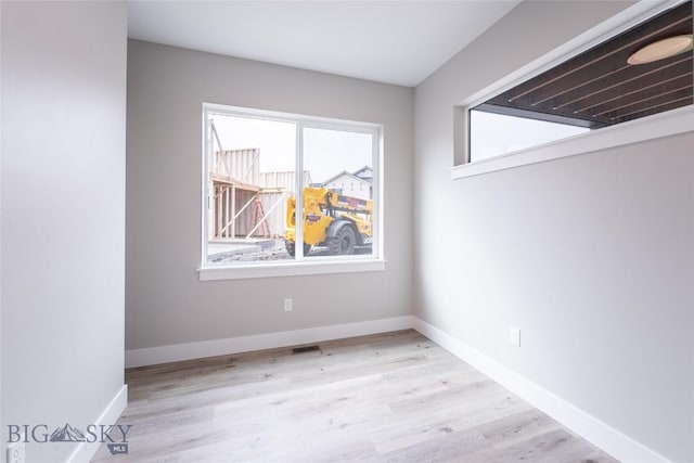 740 Rogers Way Unit B, Bozeman, MT 59718 - unfurnished room with baseboards and wood finished floors