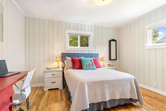 2 Harris Pl, Livingston, MT 59047 - bedroom featuring multiple windows, light wood finished floors, and a desk