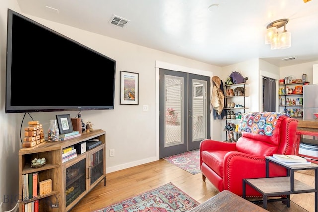 2 Harris Pl, Livingston, MT 59047 - living area featuring wood finished floors and french doors