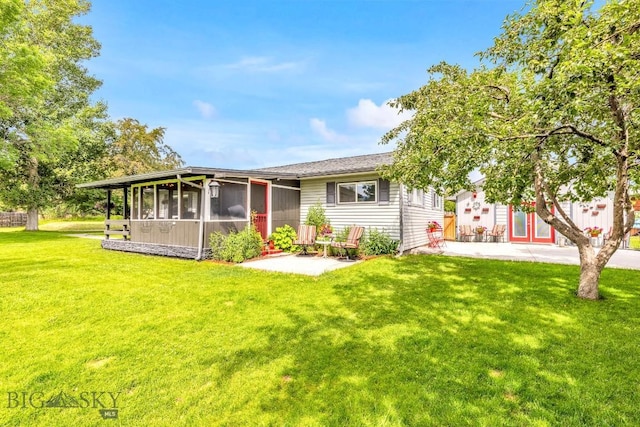 2 Harris Pl, Livingston, MT 59047 - back of house featuring a sunroom and a yard