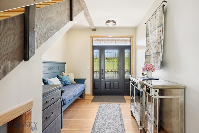 915 Point Of Rocks Rd, Whitehall, MT 59759 - foyer entrance with wood finished floors and beamed ceiling