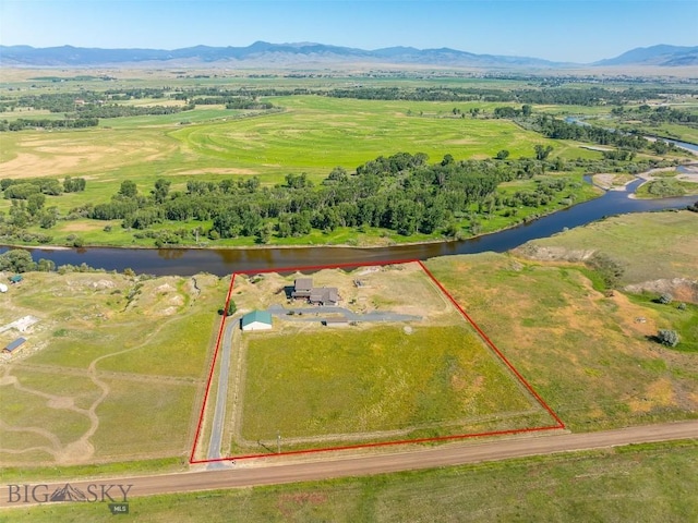915 Point Of Rocks Rd, Whitehall, MT 59759 - aerial view of sparsely populated area with property parcel outlined and a water and mountain view