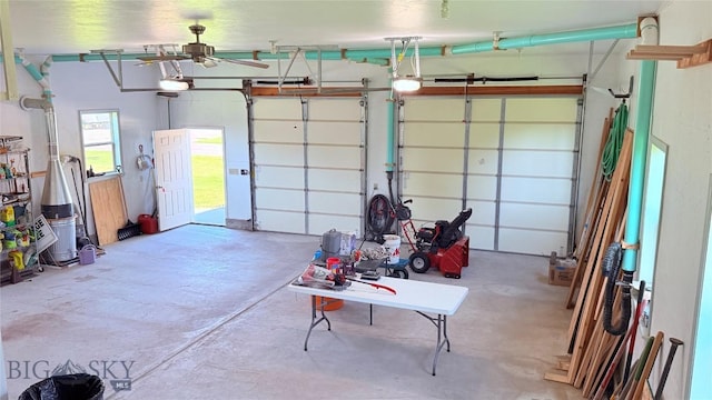 129 E Tobiano Trl, Belgrade, MT 59714 - garage featuring ceiling fan