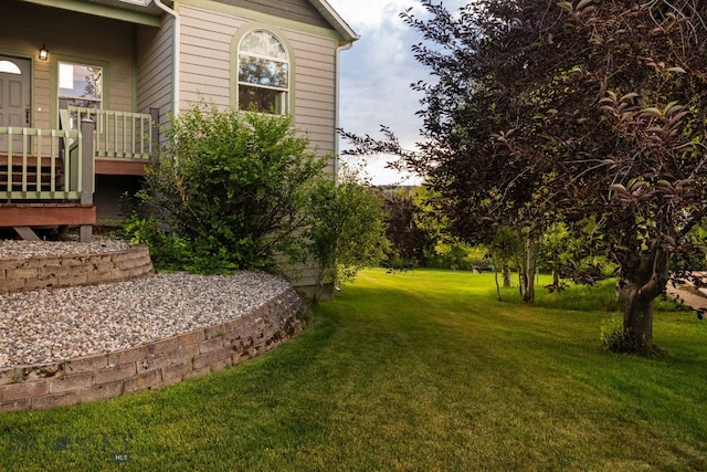 74 W Clara Ct, Bozeman, MT 59718 - view of grassy yard featuring a deck