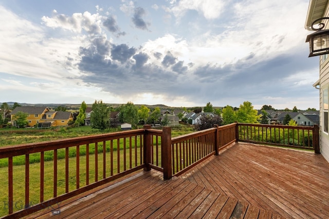 74 W Clara Ct, Bozeman, MT 59718 - deck featuring a residential view and a lawn
