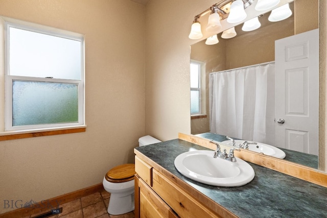 74 W Clara Ct, Bozeman, MT 59718 - bathroom with vanity, tile patterned floors, and a shower with curtain