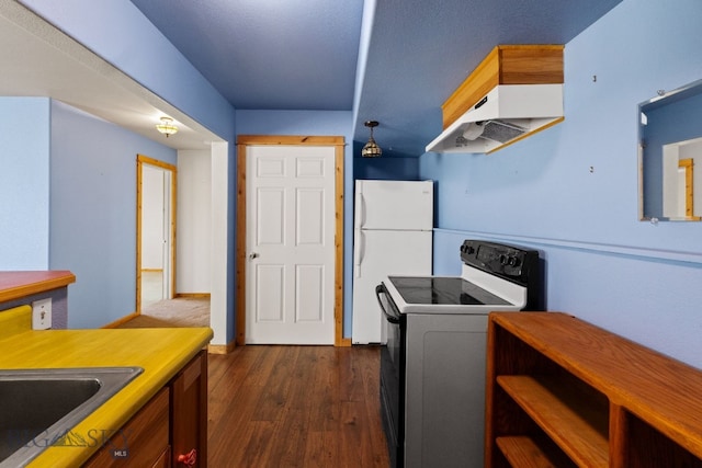 74 W Clara Ct, Bozeman, MT 59718 - kitchen with electric range, extractor fan, freestanding refrigerator, and dark wood-type flooring