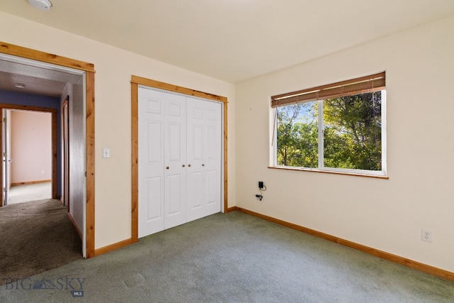 74 W Clara Ct, Bozeman, MT 59718 - unfurnished bedroom featuring carpet and a closet