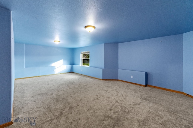 74 W Clara Ct, Bozeman, MT 59718 - carpeted empty room featuring baseboards