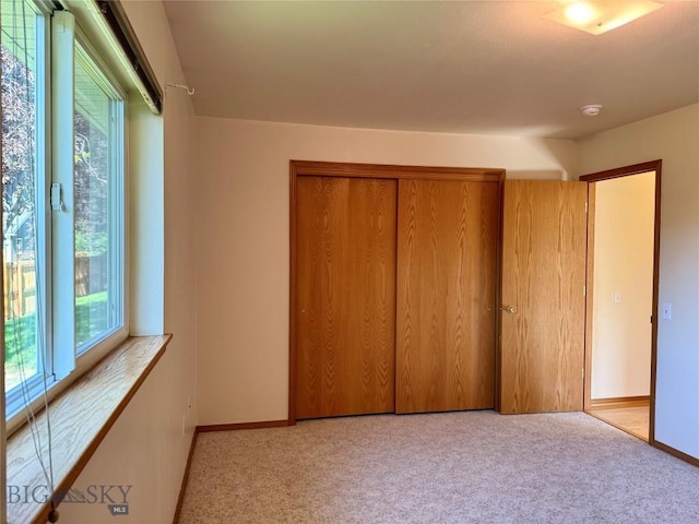 3455 W Cascade, Bozeman, MT 59718 - unfurnished bedroom featuring a closet and light colored carpet
