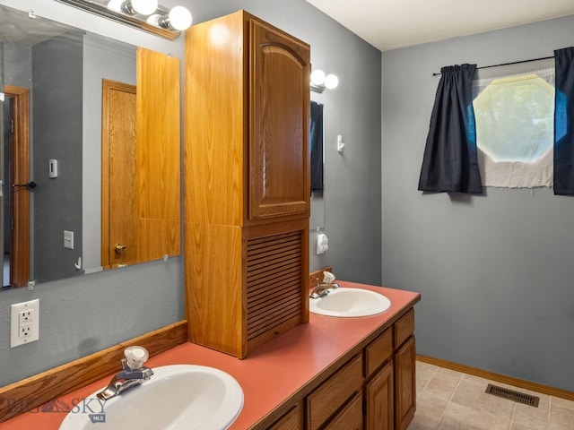 3455 W Cascade, Bozeman, MT 59718 - bathroom with double vanity and tile patterned floors