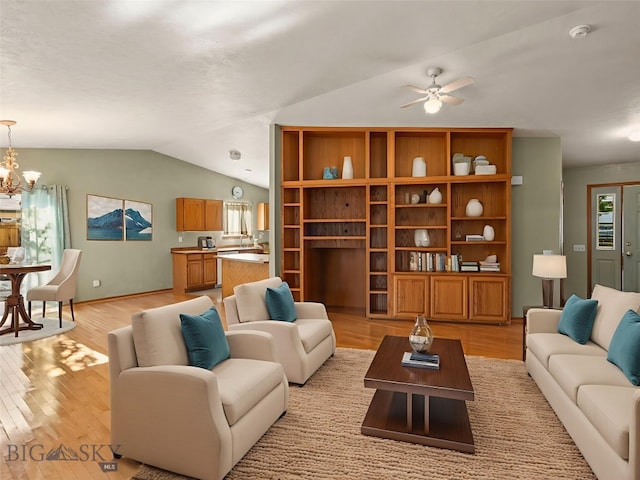 3455 W Cascade, Bozeman, MT 59718 - living room with vaulted ceiling, a ceiling fan, a chandelier, and light wood finished floors