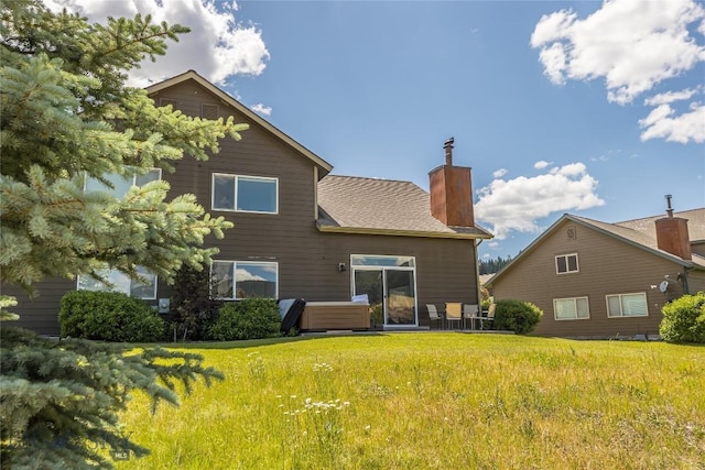 344 Candlelight Meadow Dr, Big Sky, MT 59716 - back of house featuring a chimney and a yard