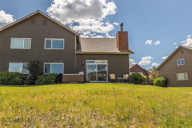 344 Candlelight Meadow Dr, Big Sky, MT 59716 - rear view of property featuring a chimney and a lawn