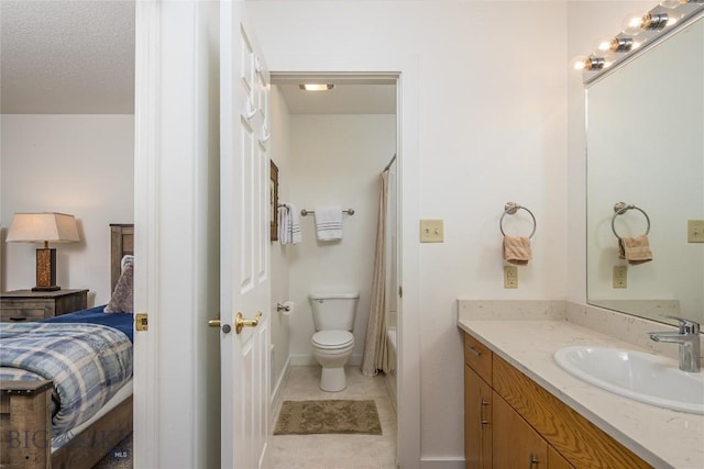 344 Candlelight Meadow Dr, Big Sky, MT 59716 - full bath featuring vanity, ensuite bath, tile patterned flooring, and shower / bath combo with shower curtain