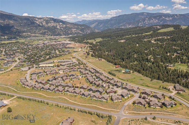 344 Candlelight Meadow Dr, Big Sky, MT 59716 - aerial view of property's location featuring mountains and nearby suburban area