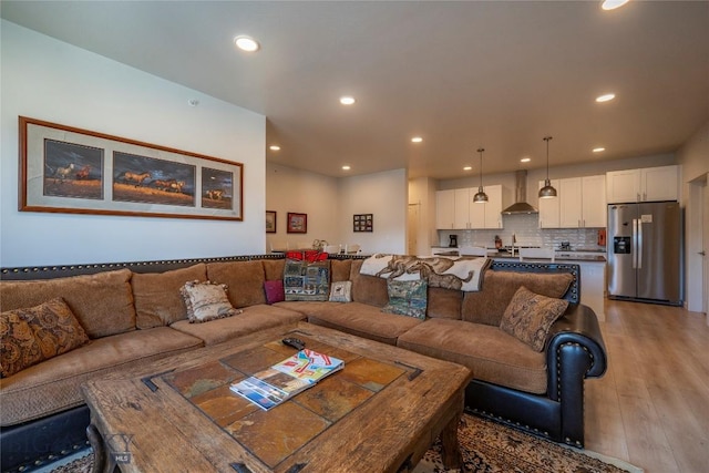 2221D Willow Dr Unit 128, Livingston, MT 59047 - living room featuring light wood finished floors and recessed lighting