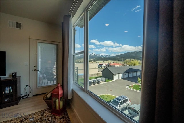 2221D Willow Dr Unit 128, Livingston, MT 59047 - interior space featuring wood finished floors and a mountain view