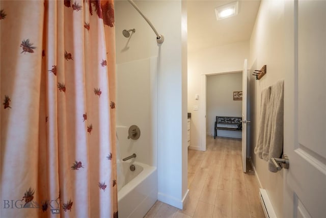 2221D Willow Dr Unit 128, Livingston, MT 59047 - full bathroom with shower / tub combo, baseboard heating, and wood finished floors