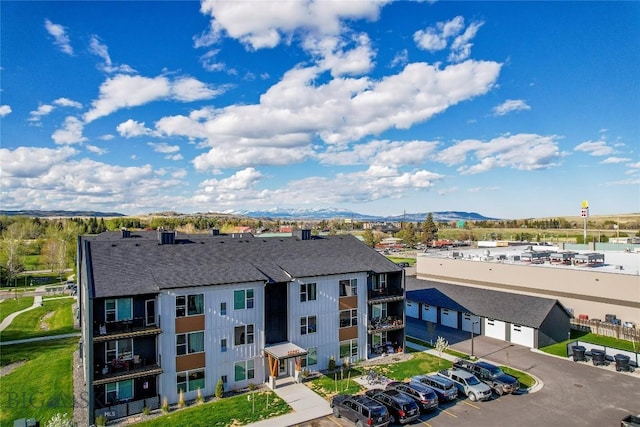 2221D Willow Dr Unit 128, Livingston, MT 59047 - view of building exterior featuring a mountain view and uncovered parking