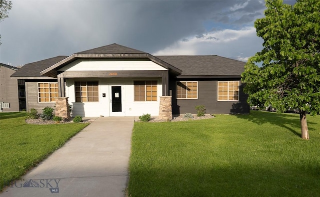 2221D Willow Dr Unit 128, Livingston, MT 59047 - view of front of home with a front yard and a shingled roof