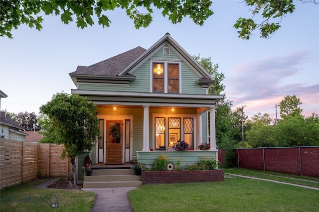 716 W Pine St, Missoula, MT 59802 - view of front of house with a porch and roof with shingles