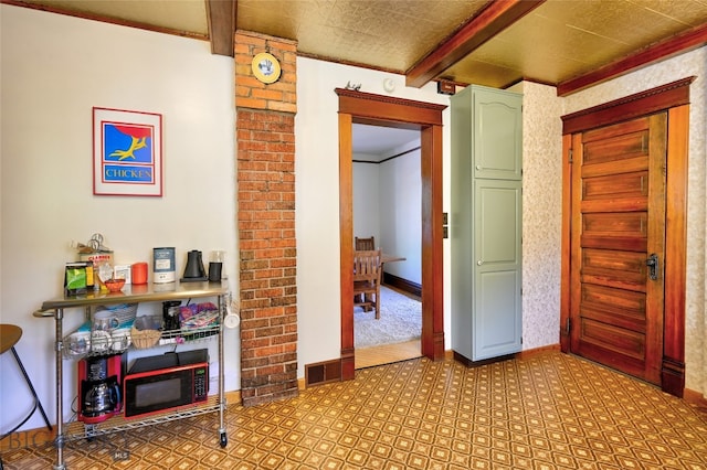 716 W Pine St, Missoula, MT 59802 - hall with baseboards and beamed ceiling