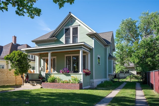 716 W Pine St, Missoula, MT 59802 - view of front of property with covered porch and a shingled roof