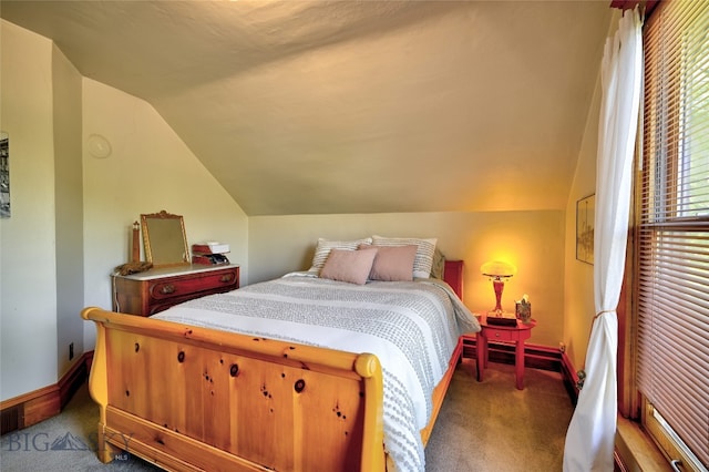 716 W Pine St, Missoula, MT 59802 - carpeted bedroom featuring vaulted ceiling and baseboards