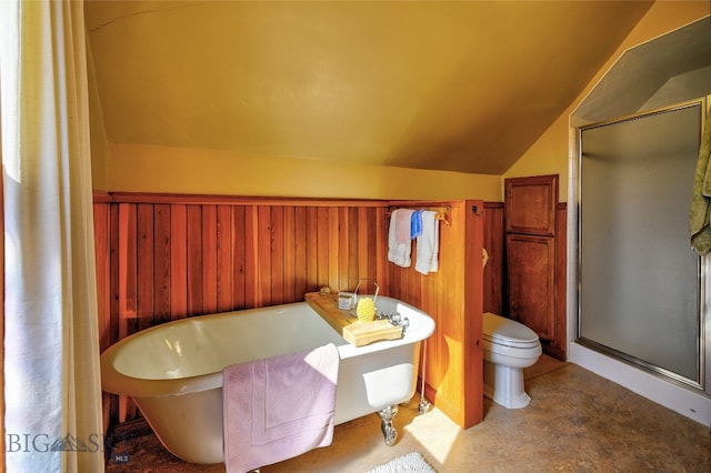 716 W Pine St, Missoula, MT 59802 - bathroom with vaulted ceiling, a shower stall, a freestanding bath, and wood walls