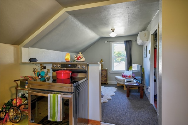 716 W Pine St, Missoula, MT 59802 - bedroom with a wall unit AC, vaulted ceiling, carpet floors, and a textured ceiling