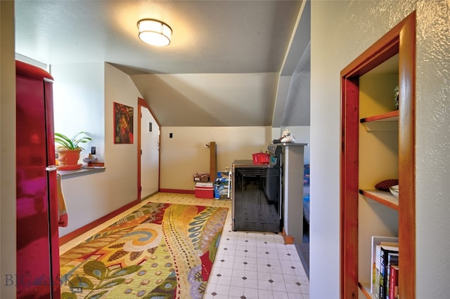 716 W Pine St, Missoula, MT 59802 - corridor featuring light flooring and vaulted ceiling