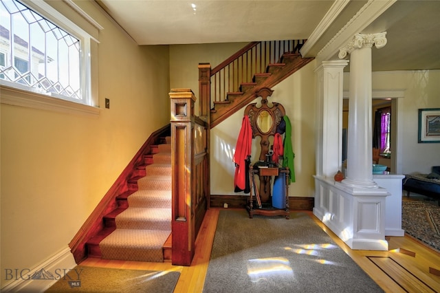 716 W Pine St, Missoula, MT 59802 - stairway featuring decorative columns and wood finished floors