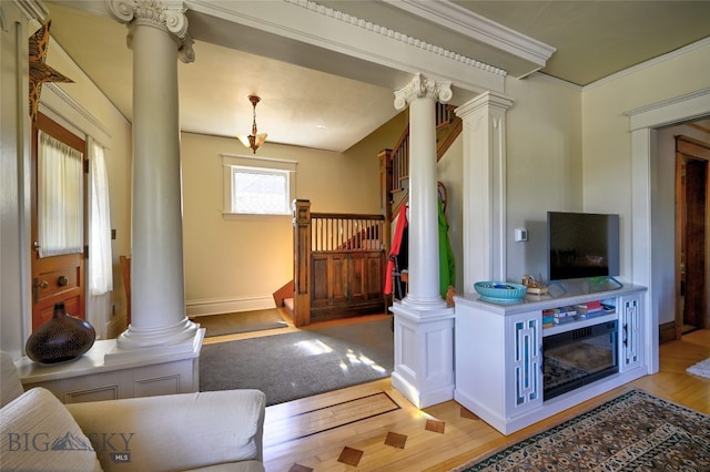 716 W Pine St, Missoula, MT 59802 - living area featuring decorative columns and light wood finished floors