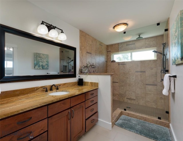 3090 Meah Ln, Bozeman, MT 59718 - bathroom with vanity, tiled shower, and tile patterned flooring