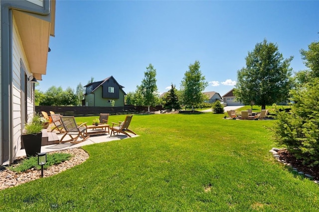 3090 Meah Ln, Bozeman, MT 59718 - view of green lawn featuring a patio