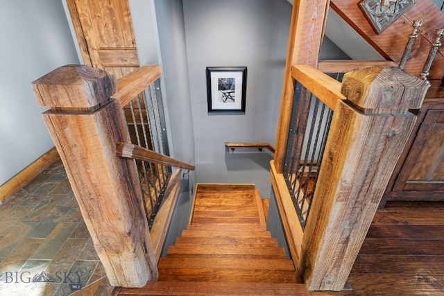 58 Upper Moose Hill Rd, Big Sky, MT 59716 - stairs with baseboards and stone tile floors