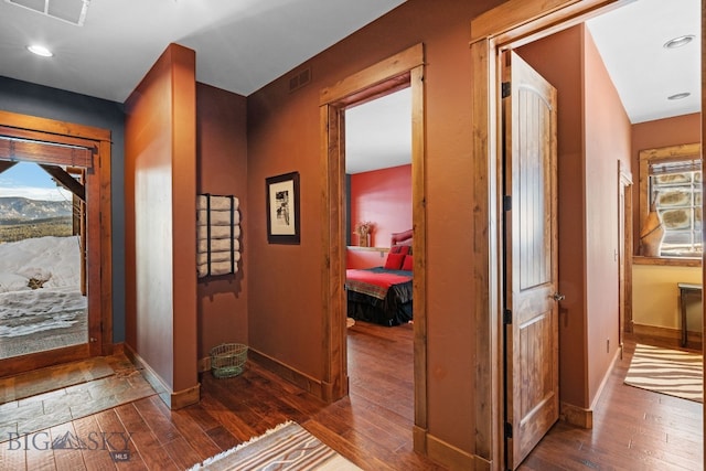 58 Upper Moose Hill Rd, Big Sky, MT 59716 - hallway with dark wood finished floors, recessed lighting, and a mountain view