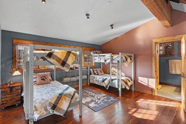 58 Upper Moose Hill Rd, Big Sky, MT 59716 - bedroom featuring lofted ceiling and hardwood / wood-style floors