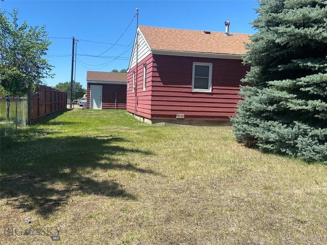 1120 A St, Butte, MT 59701 - view of side of home featuring a shingled roof