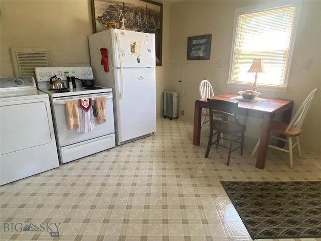 1120 A St, Butte, MT 59701 - kitchen with washer / dryer, radiator heating unit, white appliances, and light floors