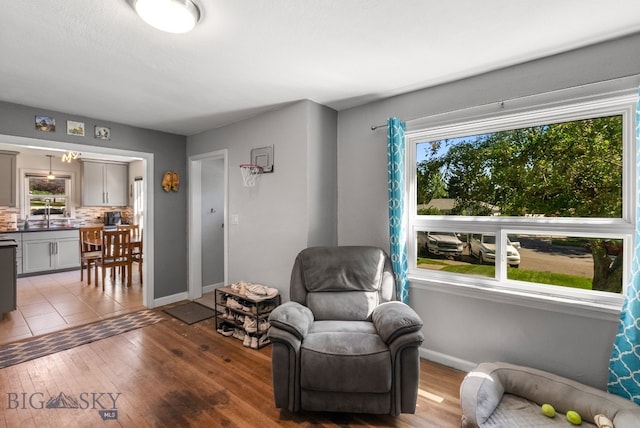 531 N Main St, Livingston, MT 59047 - sitting room with baseboards and hardwood / wood-style floors