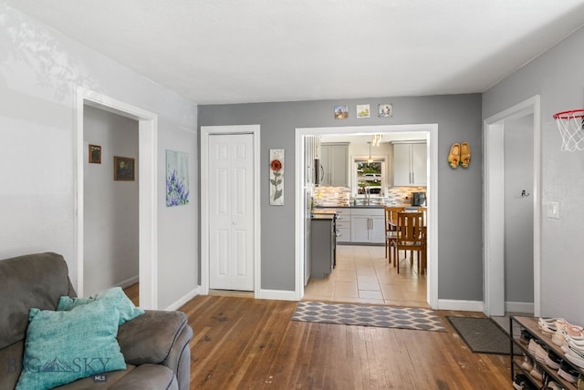 531 N Main St, Livingston, MT 59047 - sitting room featuring light wood-type flooring and baseboards