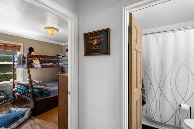 531 N Main St, Livingston, MT 59047 - bedroom with wood finished floors and ornamental molding