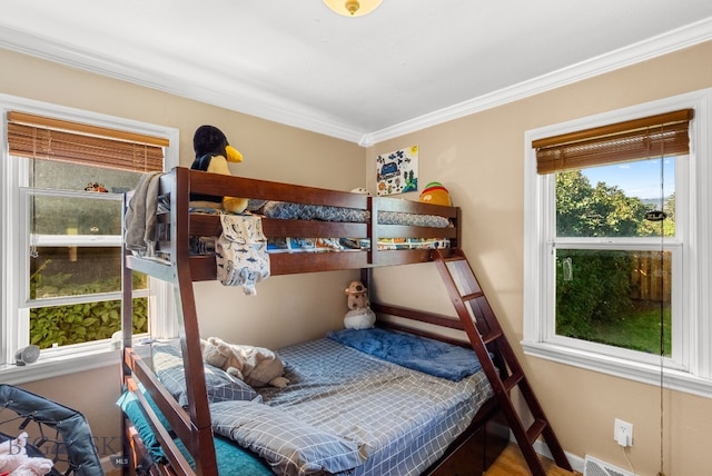 531 N Main St, Livingston, MT 59047 - bedroom featuring ornamental molding and wood finished floors