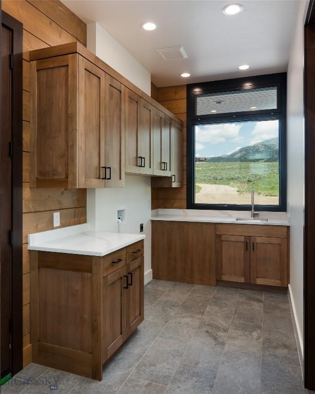 28 Elk Meadows Ranch Rd, Cameron, MT 59720 - kitchen with brown cabinets, light countertops, and recessed lighting