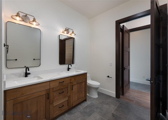 28 Elk Meadows Ranch Rd, Cameron, MT 59720 - bathroom with double vanity and toilet