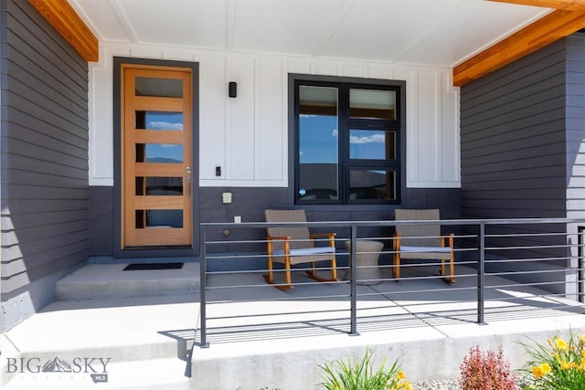 205 Albrey Trl Unit B, Bozeman, MT 59718 - view of exterior entry featuring board and batten siding and covered porch