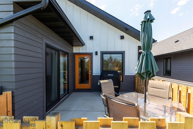 205 Albrey Trl Unit B, Bozeman, MT 59718 - rear view of house with board and batten siding and a patio