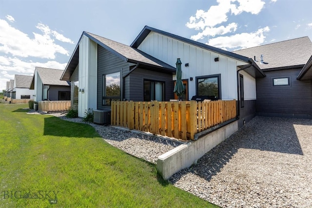 205 Albrey Trl Unit B, Bozeman, MT 59718 - back of house featuring board and batten siding and a lawn